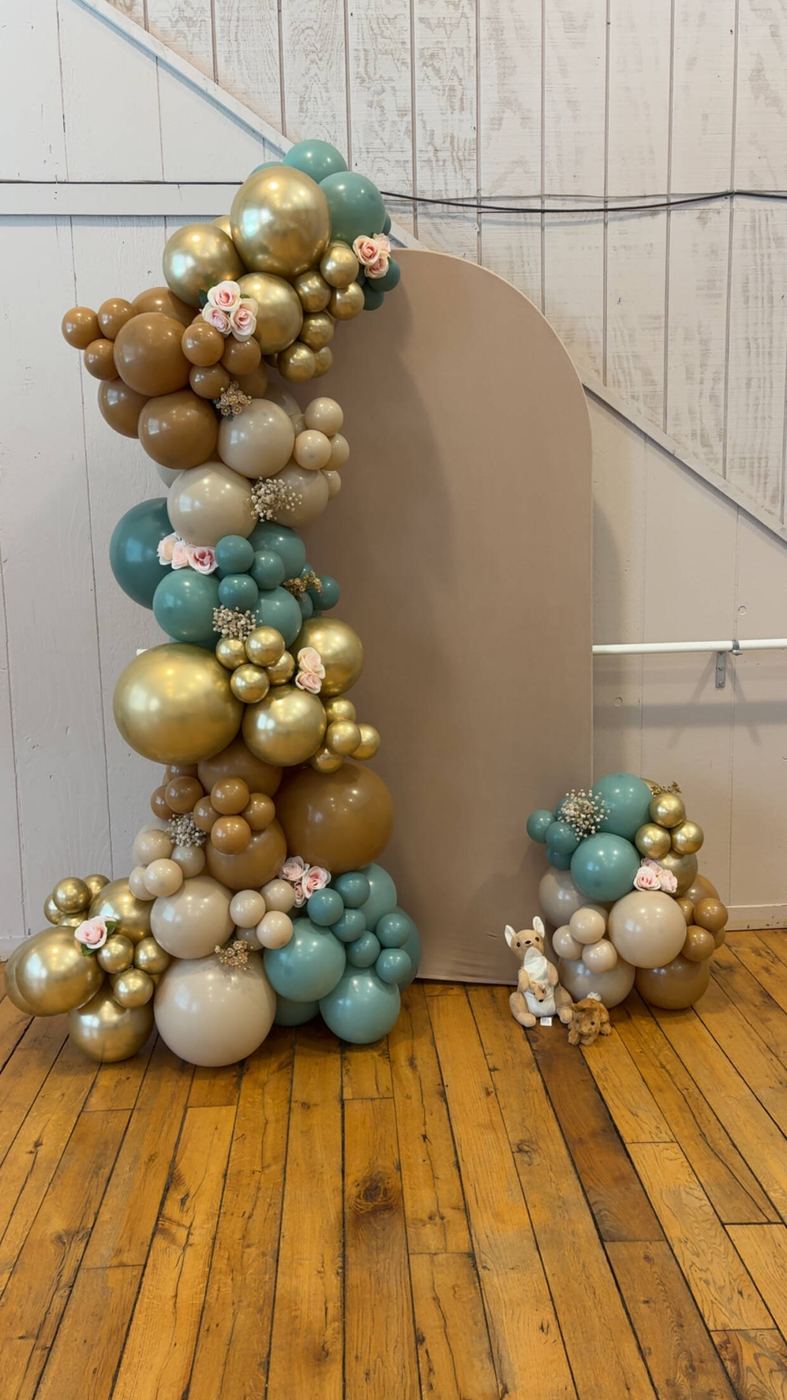 Gold, teal and blush balloon column with floral accents